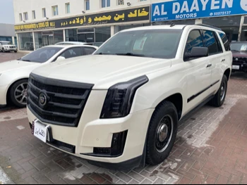 Cadillac  Escalade  2015  Automatic  279,000 Km  8 Cylinder  Four Wheel Drive (4WD)  SUV  White