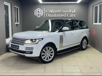Land Rover  Range Rover  Vogue  2015  Automatic  112,000 Km  8 Cylinder  Four Wheel Drive (4WD)  SUV  White  With Warranty
