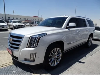 Cadillac  Escalade  2019  Automatic  105,000 Km  8 Cylinder  Four Wheel Drive (4WD)  SUV  White