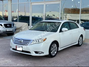 Toyota  Avalon  XLE  2011  Automatic  157,000 Km  6 Cylinder  Front Wheel Drive (FWD)  Sedan  White  With Warranty