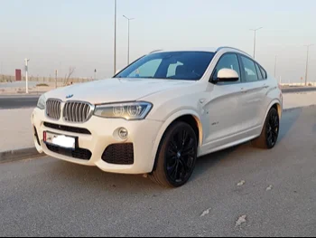 BMW  X-Series  X4 M  2017  Automatic  98,000 Km  4 Cylinder  Four Wheel Drive (4WD)  SUV  White  With Warranty