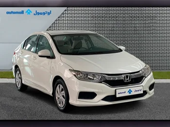 Honda  City  2019  Automatic  99,000 Km  4 Cylinder  Front Wheel Drive (FWD)  Sedan  White  With Warranty