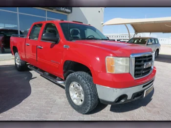 GMC  Sierra  2500 HD  2009  Automatic  400,000 Km  8 Cylinder  Four Wheel Drive (4WD)  Pick Up  Red