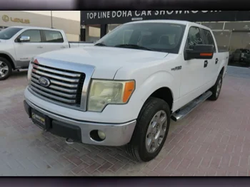 Ford  F  150  2013  Automatic  148,000 Km  8 Cylinder  Four Wheel Drive (4WD)  Pick Up  White