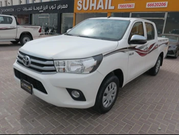 Toyota  Hilux  2020  Automatic  33,000 Km  4 Cylinder  Rear Wheel Drive (RWD)  Pick Up  White