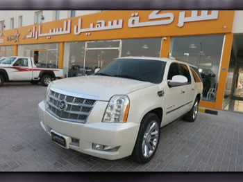 Cadillac  Escalade  Limited  2010  Automatic  61,000 Km  8 Cylinder  Four Wheel Drive (4WD)  SUV  White  With Warranty