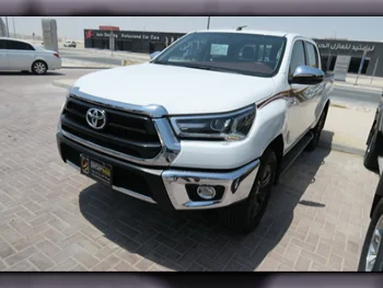  Toyota  Hilux  2022  Automatic  4,000 Km  4 Cylinder  Four Wheel Drive (4WD)  Pick Up  White  With Warranty