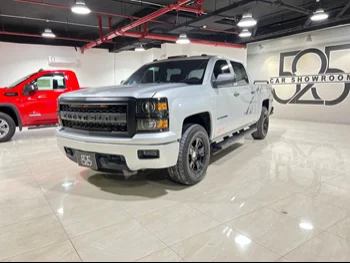 Chevrolet  Silverado  LT  2014  Automatic  198,000 Km  8 Cylinder  Four Wheel Drive (4WD)  Pick Up  White  With Warranty
