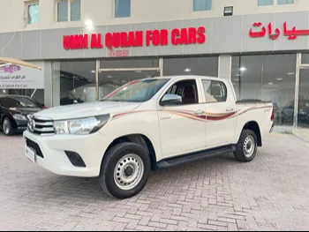 Toyota  Hilux  2019  Automatic  190,000 Km  4 Cylinder  Four Wheel Drive (4WD)  Pick Up  White  With Warranty