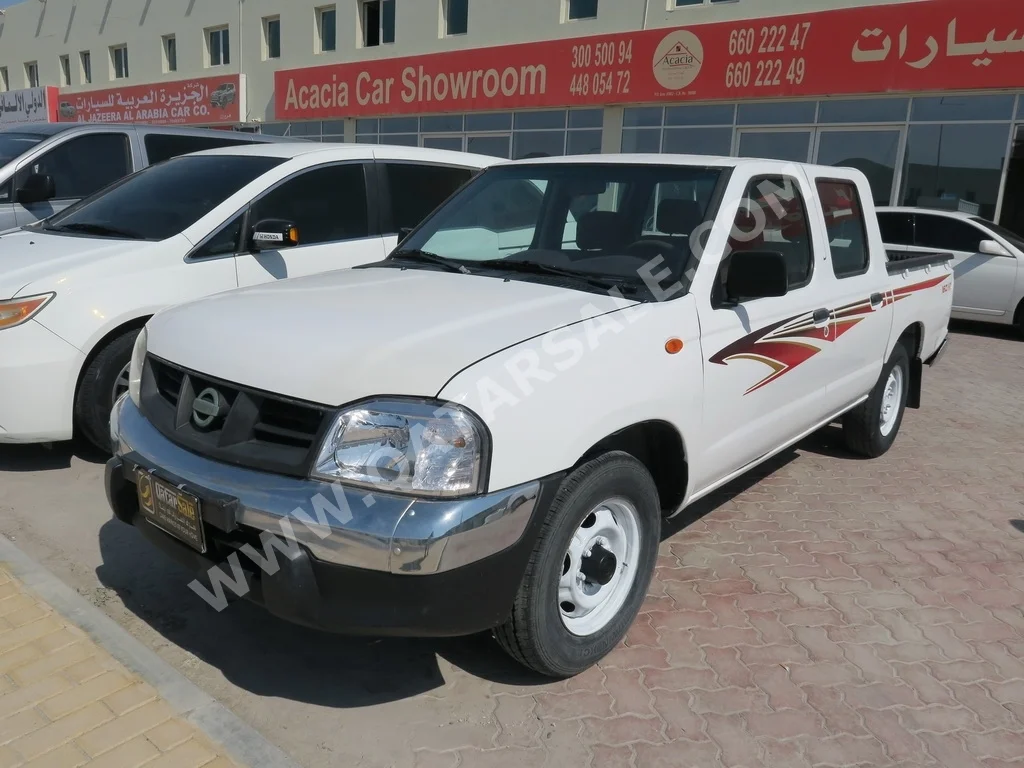 Nissan  Pickup  2015  Manual  220,000 Km  4 Cylinder  Front Wheel Drive (FWD)  Pick Up  White  With Warranty