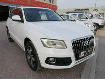 Audi  Q5  2.0 T  2013  Automatic  145,000 Km  4 Cylinder  All Wheel Drive (AWD)  SUV  White  With Warranty