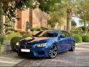 BMW  M-Series  6  2015  Automatic  69,000 Km  8 Cylinder  Rear Wheel Drive (RWD)  Sedan  Blue  With Warranty