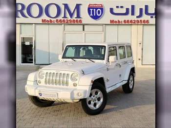 Jeep  Wrangler  Sahara  2014  Automatic  112,000 Km  6 Cylinder  Four Wheel Drive (4WD)  SUV  White  With Warranty