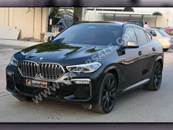  BMW  X-Series  X6 M50i  2021  Automatic  25,000 Km  8 Cylinder  Four Wheel Drive (4WD)  SUV  Black  With Warranty