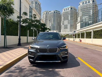 BMW  X-Series  X1  2018  Automatic  84,000 Km  4 Cylinder  Four Wheel Drive (4WD)  SUV  Gray