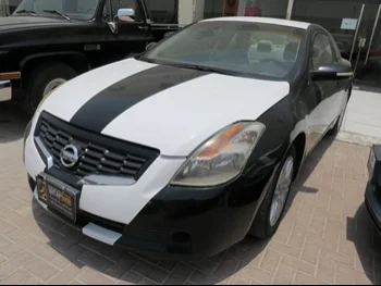 Nissan  Altima  3.5 SE  2008  Manual  321,000 Km  6 Cylinder  Front Wheel Drive (FWD)  Coupe / Sport  Silver