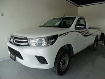 Toyota  Hilux  2019  Automatic  73,000 Km  4 Cylinder  Four Wheel Drive (4WD)  Pick Up  White
