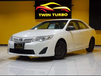 Toyota  Camry  GL  2015  Automatic  82,000 Km  4 Cylinder  Front Wheel Drive (FWD)  Sedan  White