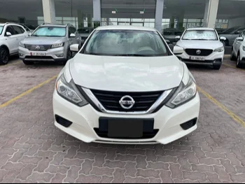 Nissan  Altima  2018  Automatic  76,000 Km  4 Cylinder  Front Wheel Drive (FWD)  Sedan  White