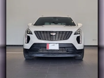 Cadillac  XT4  2019  Automatic  95,000 Km  4 Cylinder  Four Wheel Drive (4WD)  SUV  White