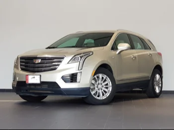 Cadillac  XT5  2017  Automatic  64,000 Km  6 Cylinder  Four Wheel Drive (4WD)  SUV  Gold  With Warranty