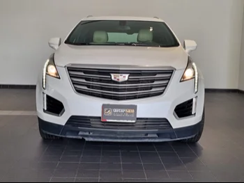 Cadillac  XT5  2018  Automatic  86,000 Km  6 Cylinder  Front Wheel Drive (FWD)  SUV  White  With Warranty