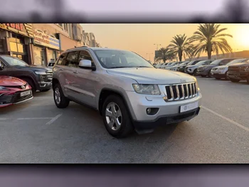 Jeep  Grand Cherokee  2012  Automatic  141,000 Km  6 Cylinder  Four Wheel Drive (4WD)  SUV  Silver  With Warranty