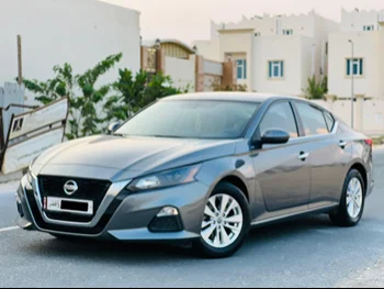 Nissan  Altima  2022  Automatic  28,000 Km  4 Cylinder  Front Wheel Drive (FWD)  Sedan  Gray  With Warranty