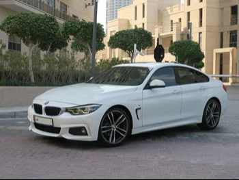 BMW  4-Series  420 I  2018  Automatic  75,000 Km  4 Cylinder  Rear Wheel Drive (RWD)  Sedan  White