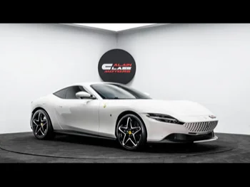 Ferrari  Roma  2021  Automatic  4,553 Km  8 Cylinder  Rear Wheel Drive (RWD)  Coupe / Sport  White  With Warranty