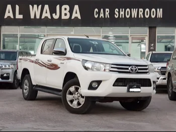 Toyota  Hilux  2018  Manual  180,000 Km  4 Cylinder  Four Wheel Drive (4WD)  Pick Up  White  With Warranty