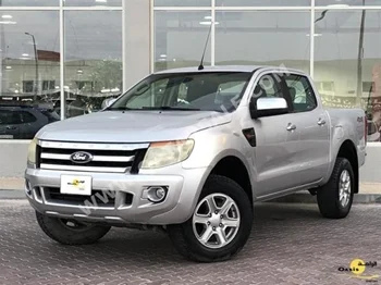 Ford  Ranger  2015  Manual  48,000 Km  4 Cylinder  Four Wheel Drive (4WD)  Pick Up  Silver  With Warranty