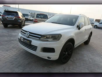Volkswagen  Touareg  2014  Automatic  140,000 Km  6 Cylinder  All Wheel Drive (AWD)  SUV  White